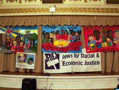 The “Respect the Work” banners were displayed during a press conference calling for economic justice for domestic workers.