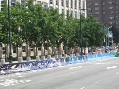 The mural installed on one side of the Tillary Street traffic barrier.